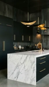 Matte black kitchen cabinets with gold handles